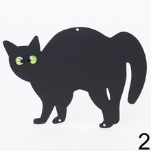 Plášič na vtáky v tvare kocúra.