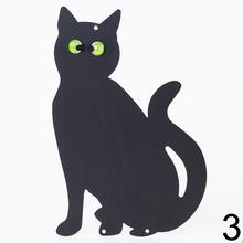 Plášič na vtáky v tvare kocúra.