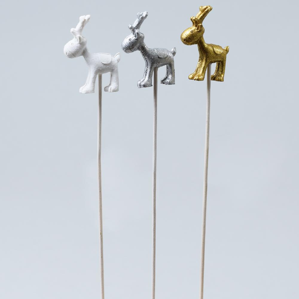 Sada tří sobů v různých barvách na zapíchnutí.