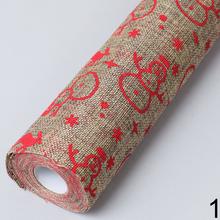 Organza juta s vianočným motívom v šedej a červenej farbe.