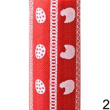 Štyri rolky juty s veľkonočnými motívmi v rôznych farbách.