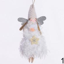 Biele anjeliky s trblietavými krídlami a ozdobami.