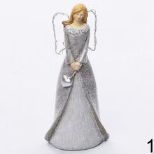 Vianočný anjel s LED krídlami v striebornej farbe.