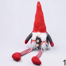 Vianočné dekorácie - textilní trólovia s červenými čiapkami.