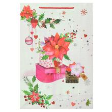 Darčeková taška s vianočným motívom a glitrom.