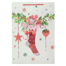 Darčeková taška s vianočným motívom a glitrom.