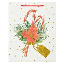 Darčeková taška s vianočným motívom a glitrami.