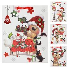 Vianočná darčeková taška s glitrom a motívom zvierat.