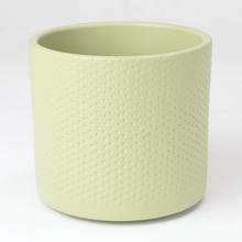 Okrúhly keramický obal Era s reliéfom v béžovej farbe.