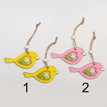 Drevené vtáčiky na zavesenie v mixe farieb.