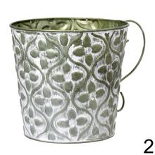 Obal s uchom v zelenom ornamentálnom dizajne.