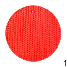 Silikónová podložka pod hrnce v oranžovej a fialovej farbe.