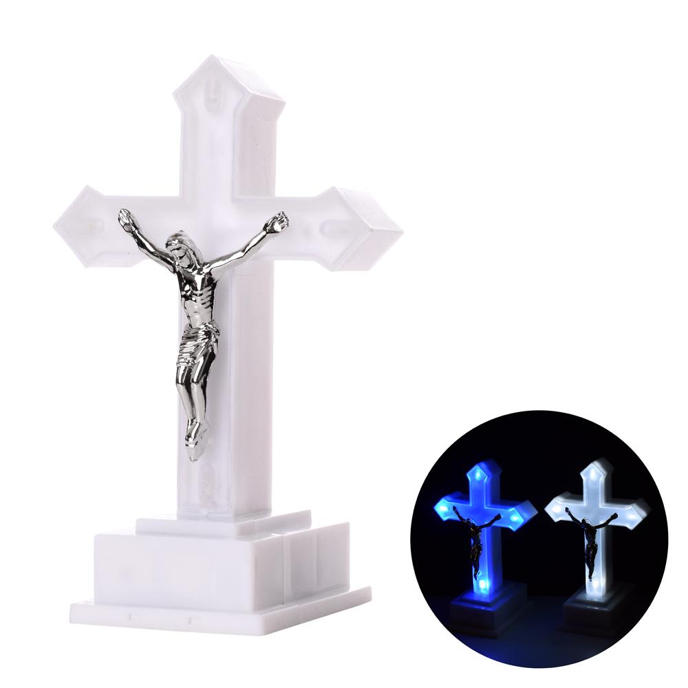 LED kříž s postavou Ježíše, 13 cm vysoký.