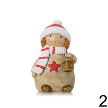 Detské figúrky v mikulášskych čiapkach a šáloch v béžovej, červenej a bielej farbe.