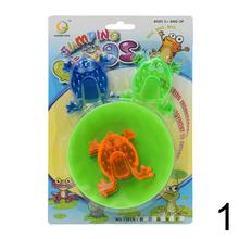 Hra ŽABKY s farebnými žabkami a kruhom.