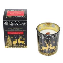 Voňavá sviečka v skle s vianočným motívom.