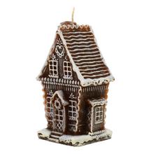 Malý hnedý perníkový domček sviečka.