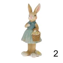 Zajačik a zajačica s košíkom, zelená farba, keramické dekorácie.