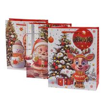 Darčeková taška s vianočnými motívmi a glitrom.