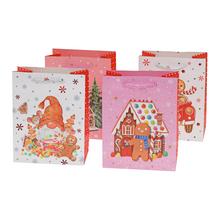 Darčeková taška s vianočnými motívmi a glitrami.