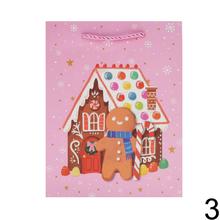 Darčeková taška s vianočnými motívmi a glitrami.