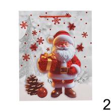 Vianočná darčeková taška s glitrami a motívom Mikuláša.