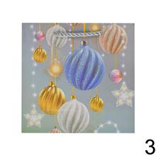 Darčeková taška s vianočnými motívmi a glitrami.