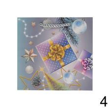 Darčeková taška s vianočnými motívmi a glitrami.