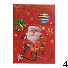 Darčeková taška na Vianoce v červenej farbe s motívom Santa Clausa a vianočných ozdôb.