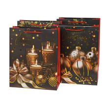 Darčeková taška na Vianoce v čiernej farbe s mixom dekorácií.