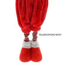 Stojaci sob z látky v červenej farbe s vianočným oblečením.