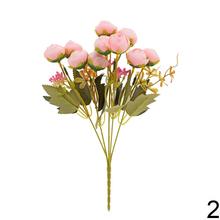 Umelá kytička ranunculus v mixe farieb.