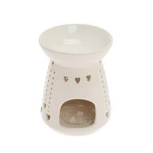 Biela aromalampa so srdiečkovým vzorom.