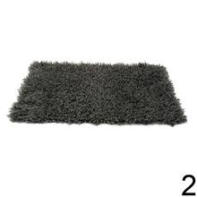 Koberček fluffy 60x90cm v béžovej a šedej farbe.