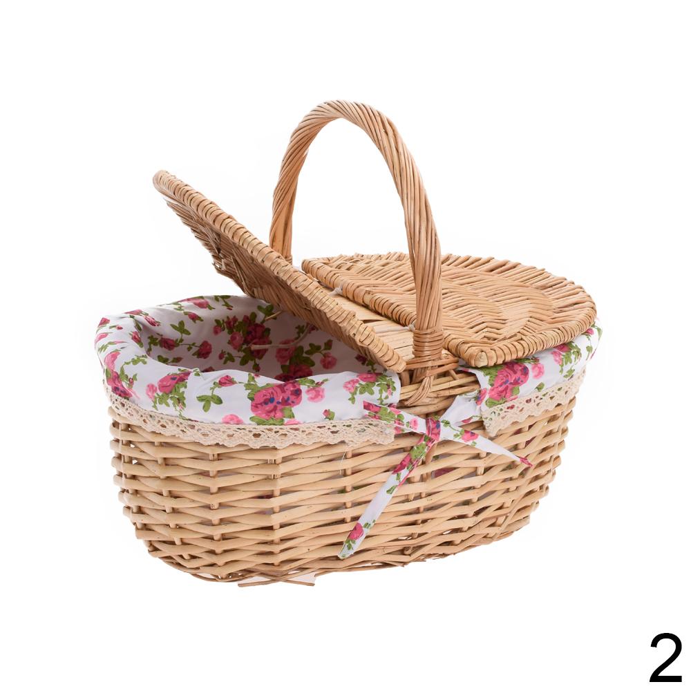 Proutěný piknikový košík oválný tmavě hnědý s rukojetí.