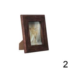 Drevený fotorámik z mangového dreva s rozmermi 16x2cm.