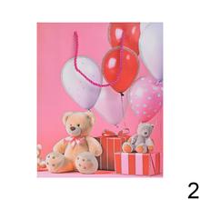 Darčeková taška s medvedíkom a balónmi.