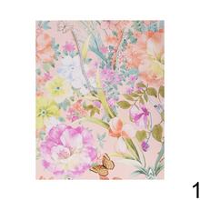 Darčeková taška s kvetinovým vzorom a trblietkami.