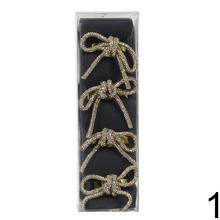 Kružky na servítky v červenej a zlatej farbe.