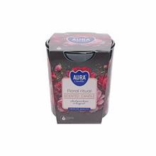 Voňavá sviečka v skle s kvetinovým motívom.