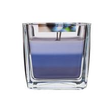 Aromatická sviečka v skle s ovocnou vôňou lesných plodov.