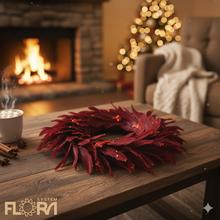 Bordový veniec z peria s priemerom 40 cm.