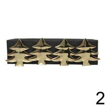 Zlaté obrúčky na servítky s motívmi soba, stromčeka a hviezdy.