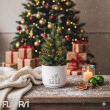 Biely kvetináč s ilustráciou jeleňov.