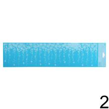 Vianočná fólia na okná s modrým pozadím a bielymi snehovými vločkami.