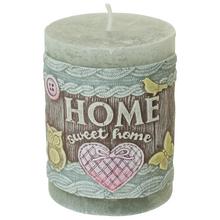 Šedá svíčka s dekorativním motivem 'HOME sweet home'.