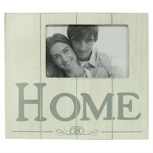 Rámeček s nápisem HOME, ideální na fotografie.