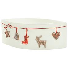 Vánoční svíčka s motivem vánočních sušenek.