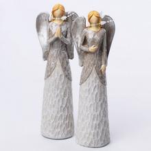 Dekorační anděl se stříbrným glitrem.