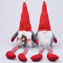 Vánoční dekorace - textilní trólové s červenými čepicemi.